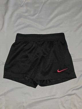 Size 4 Nike Black Mesh Athletic Shorts with Pink Swoosh